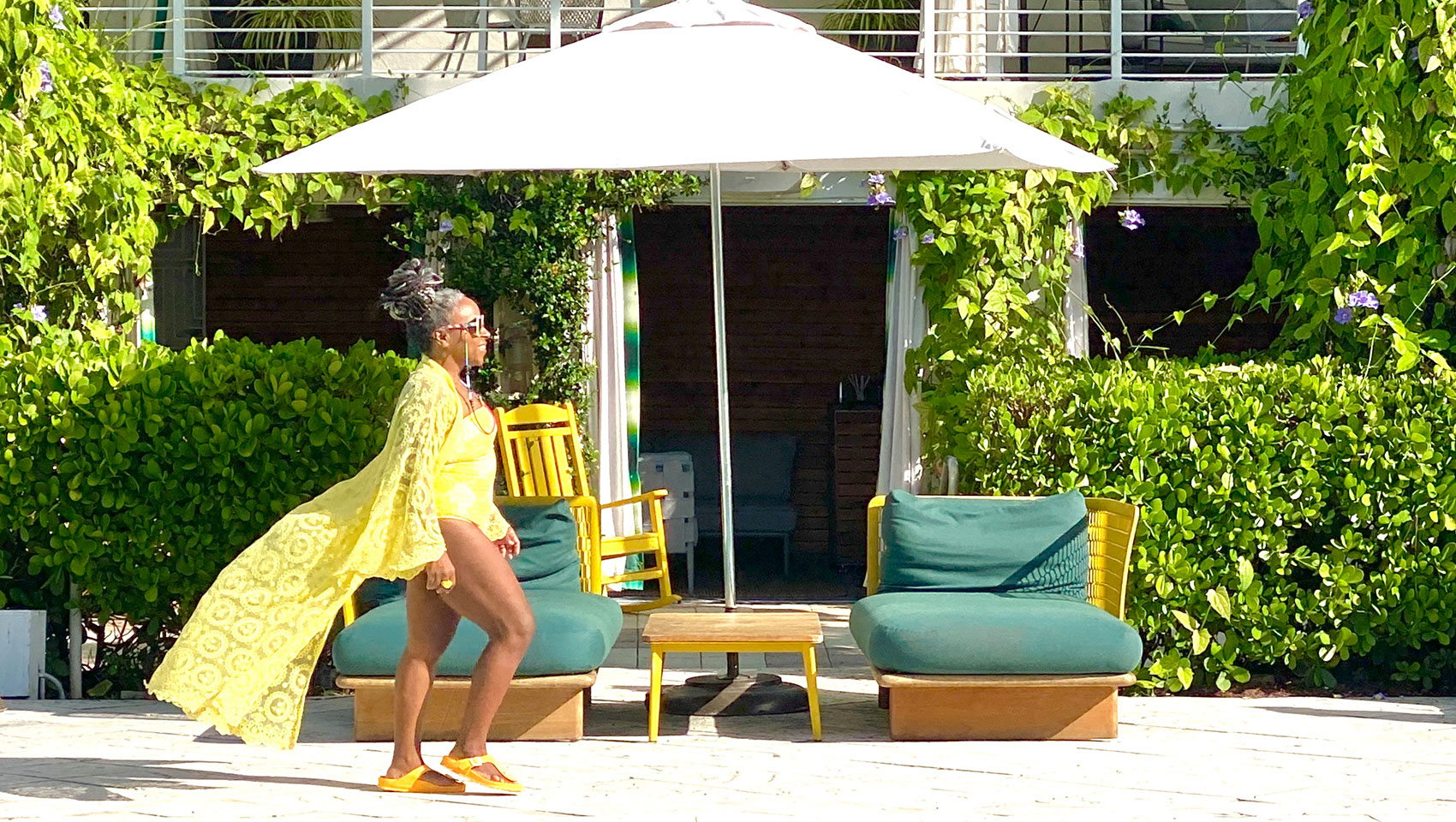 Lady walking on pool deck