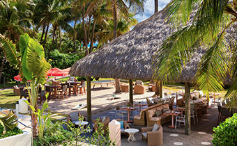 Outdoor seating at Solei Beach Club