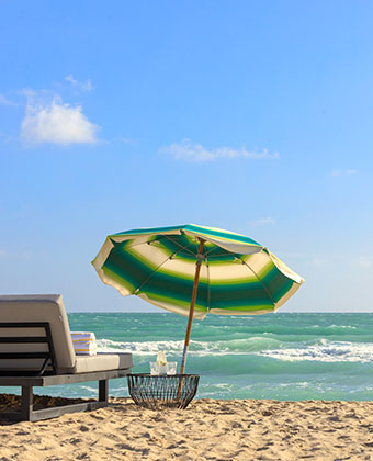 Surfcomber beach umbrella and chair on the beach