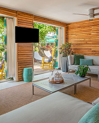 poolside private cabanas with local artist artwork
