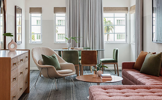 1 King 1 Bedroom Suite sitting area at Kimpton Surfcomnber Hotel